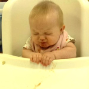 Our niece trying fruit for the first time.  :)